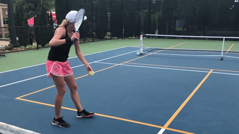 The sideways body position will make it easy to rotate through the serve, thus generating power. This is similar to other sports that involve ball striking: golf, baseball, hockey. Notice the minimal, relaxed movement of the left hand. The ball rests easily in the fingers.