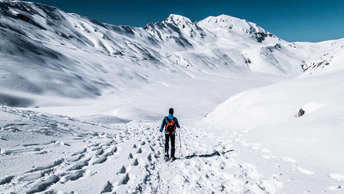 guy-hiking-in-snow_h.jpg