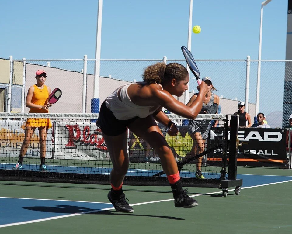 Jessie Irvine chasing down a shot from Leigh Waters. Courtesy ProPickleball.