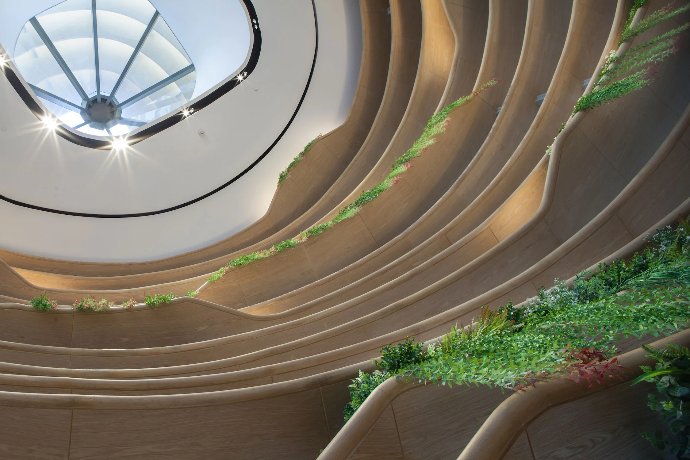 An idea of porosity allows visual connection among the multiple levels of the retail environment. A 20-meter-tall cocoon-like structure made of teakwood penetrates the bridge, connecting the old and new wings. Visible from the street, it is highlighted as the architectural focal point of the development. The retail podium is scheduled to be launched in first half of 2017. Other parts of the mall and the office tower are scheduled to be launched later that year.