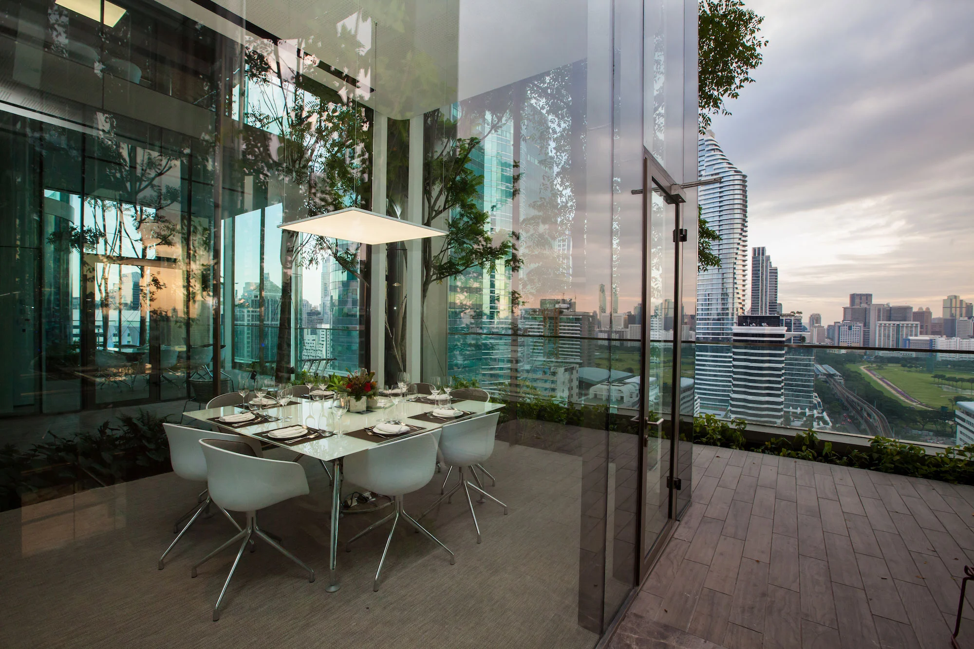 Linked by a glass lift, the two levels feature glass meeting pods that are nestled within tropical trees to create a relaxing resort like work and networking environment for young companies. The other amenities include a cafe, a reading lounge, a 200 people multi-functional auditorium, some private offices and meeting rooms.