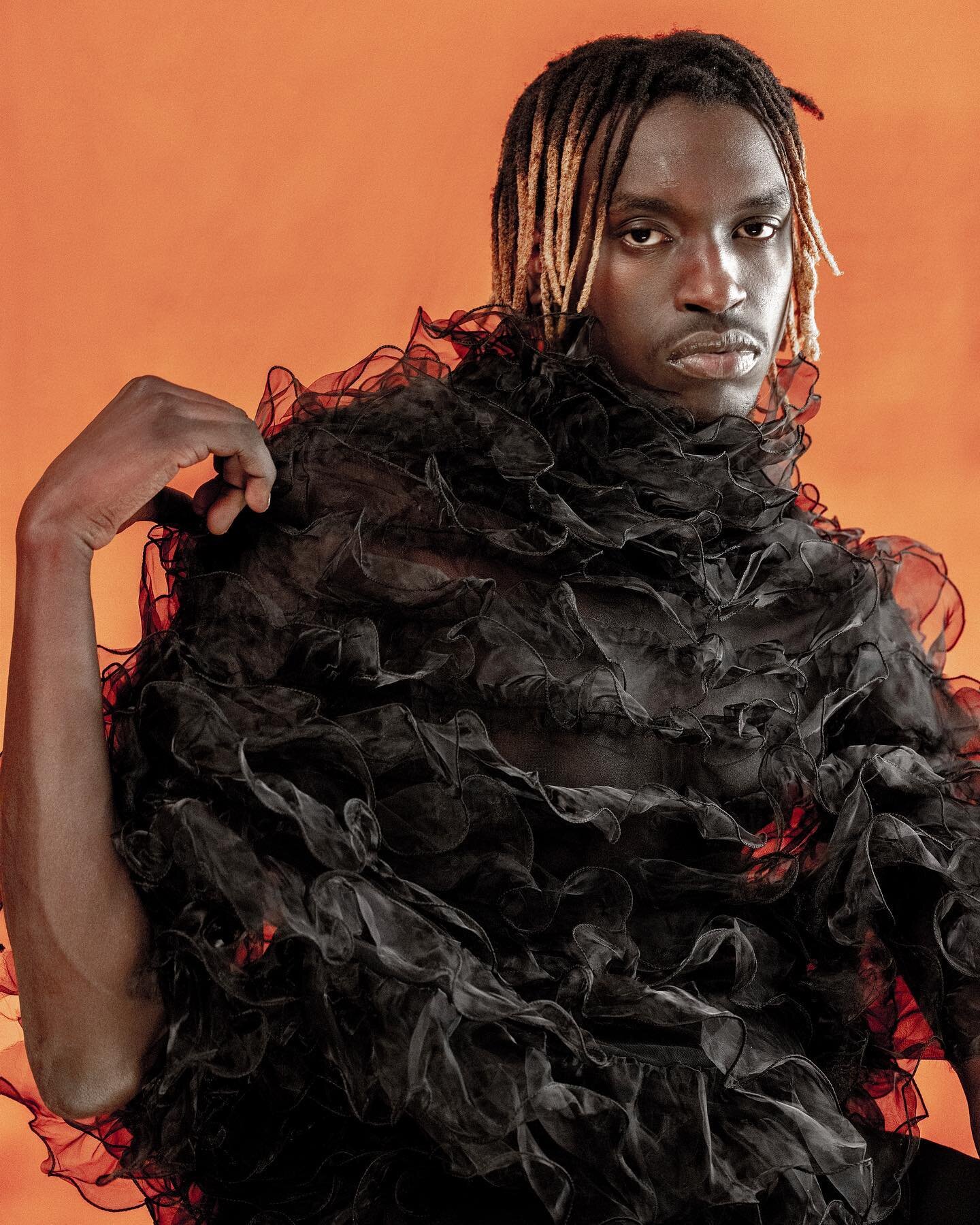 Deng 🔸 #burnedorange #fashionphotography #blackruffles #malemodel #deng #editorial #orange #dreadlocks #hairstyle #menshair #edgy #esakapila #makeportraits #blackswan #かっこいい　#いいね　#すごい