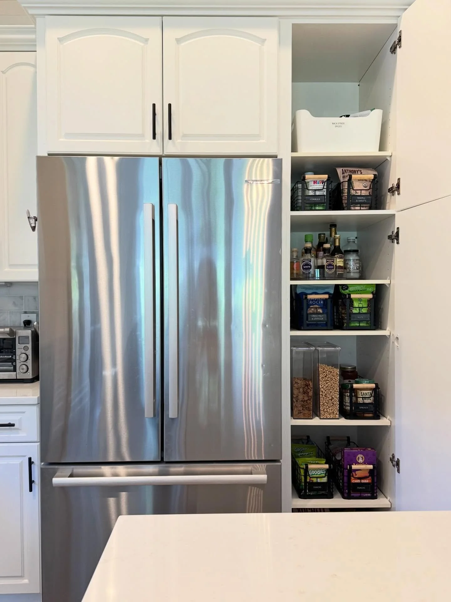 Function or aesthetics: which is more important?

We say, both!

Function is what makes a space work. Aesthetics are what make you want to keep it that way.

This cabinet was reworked to support how this family actually uses it day to day with simple