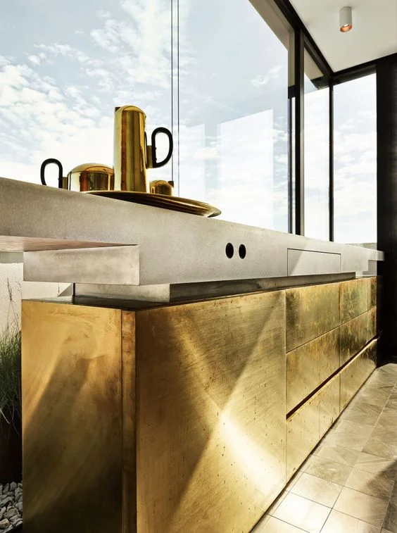 A minimalist leo? (do those exist??) Step up your game with highly textured gold cabinetry.