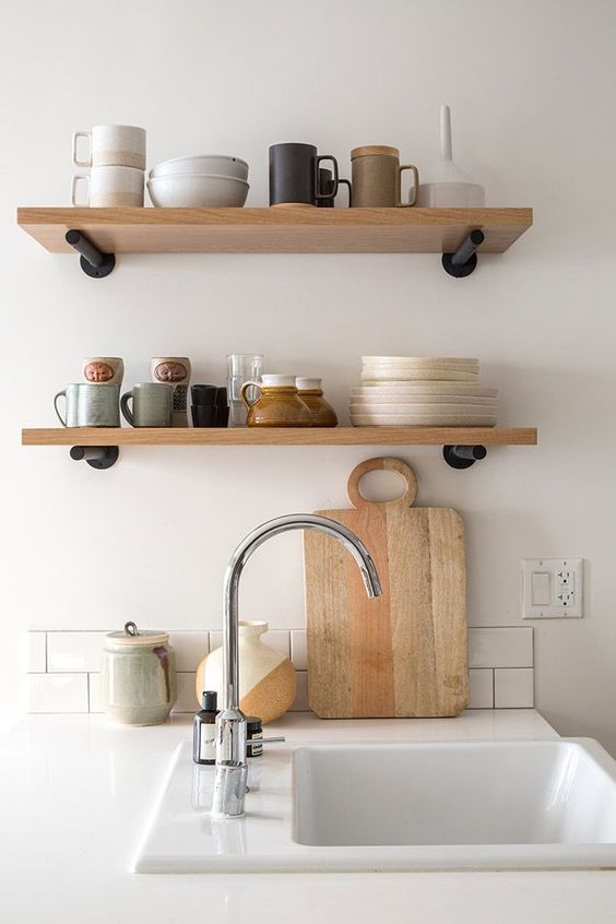 Okay, I’m just a sucker for open shelving because it requires the user to maintain a curated, clean collection of dishes.