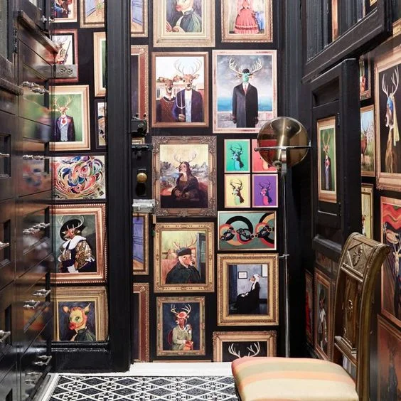 A faux-gallery wall using wallpaper gives a cleaner maximalist vibe.