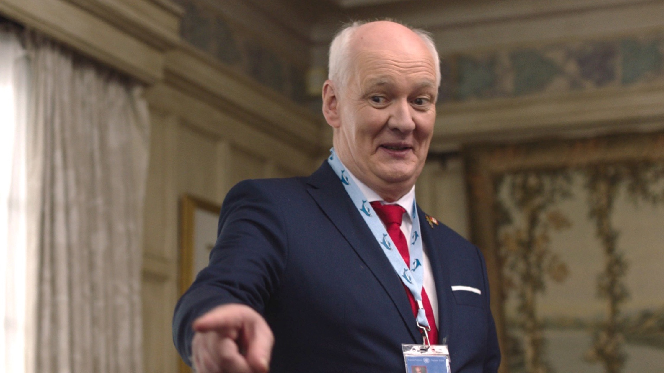 Colin Mochrie as Ambassador MacDonald in The Mission . 