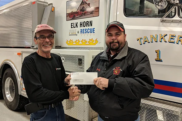 METC's Jim Lindgren presenting to Andy Ring representing the Elk Horn Fire & Rescue