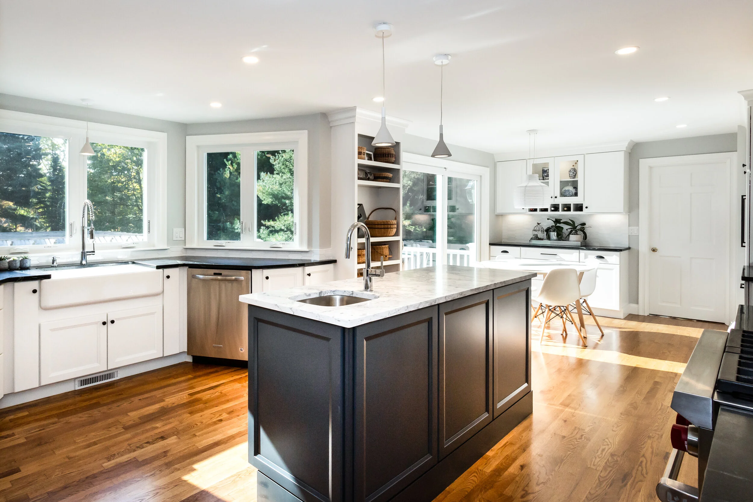  Redesign and renovation of kitchen, master bathroom and walk-in closet.  Construction of large multi-tiered deck. Replaced windows and siding at rear of home and installed 2nd floor air conditioning. 