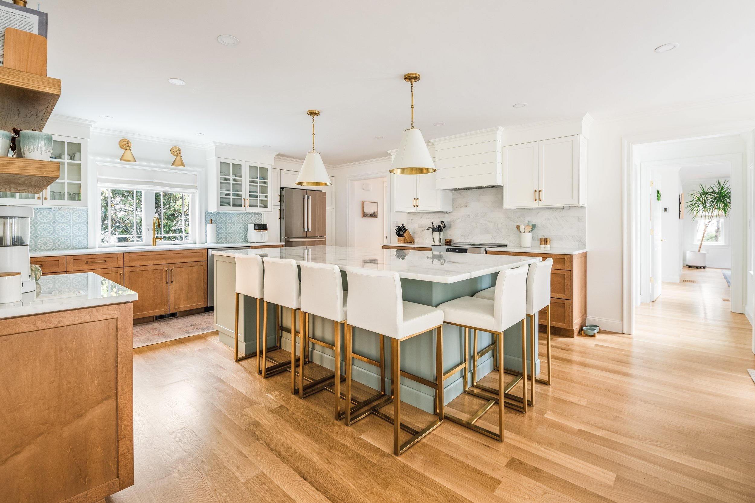 Extensive redesign of an early 1900s home, with two additions, resulting in an elegant and functional layout.