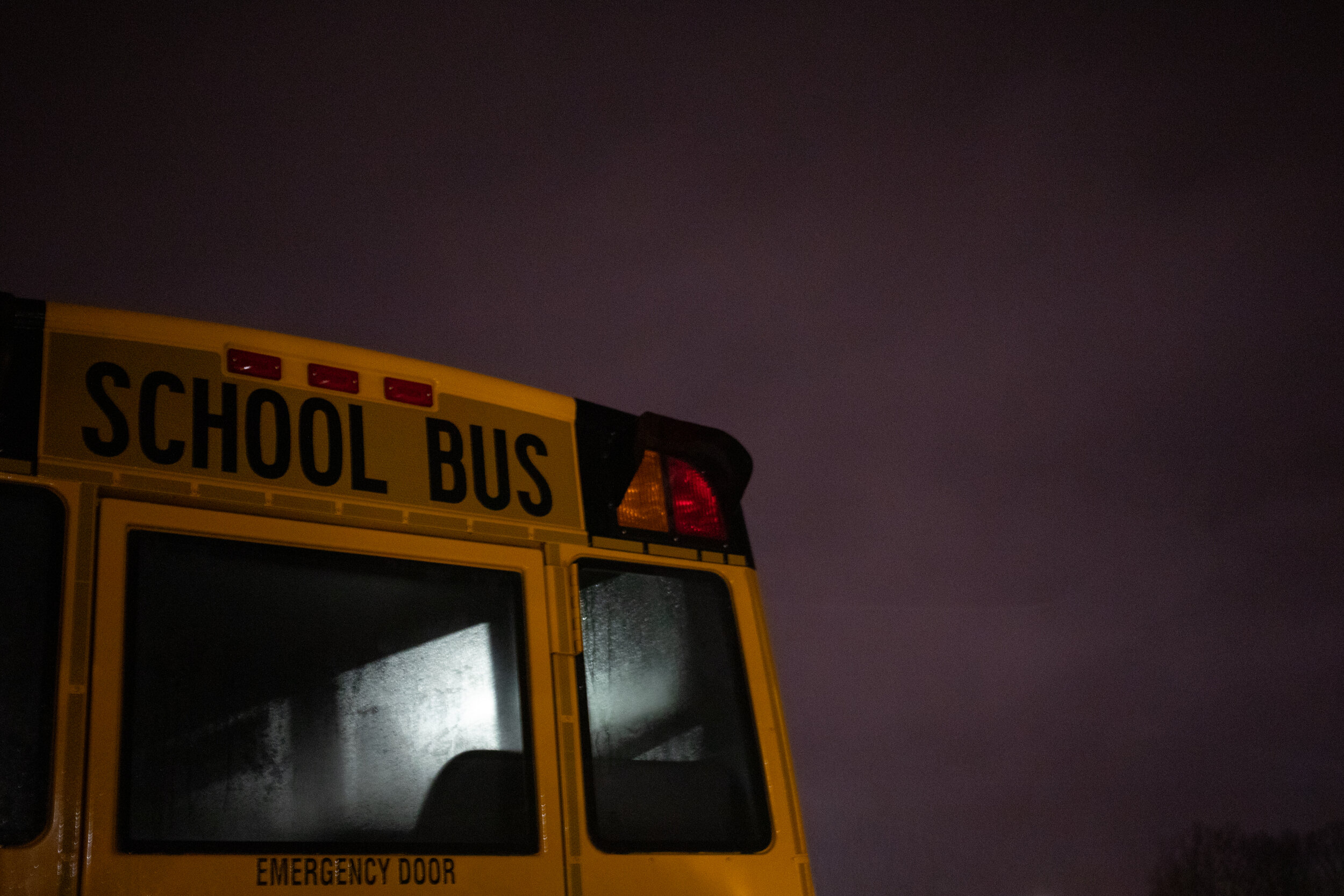  A school bus is seen parked in the Heritage High School parking lot after sunset on February 9, 2019 in Lynchburg, Virginia. (Emily Elconin for The News &amp; Advance) 
