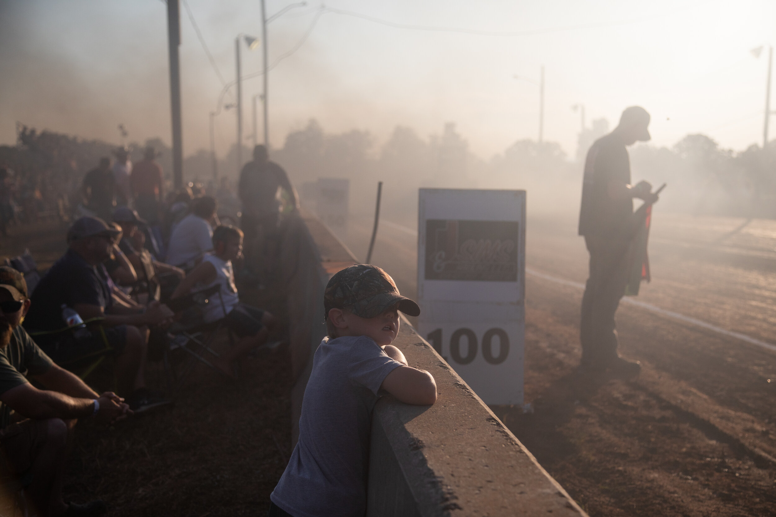  Gunner Patterson, 5, looks out onto the track from the sidelines waiting for the next truck pull during the 13th Annual Truck and Tractor Pull Saturday, September 7, 2019 at Sims Farm. (Emily Elconin for The News &amp; Advance) 