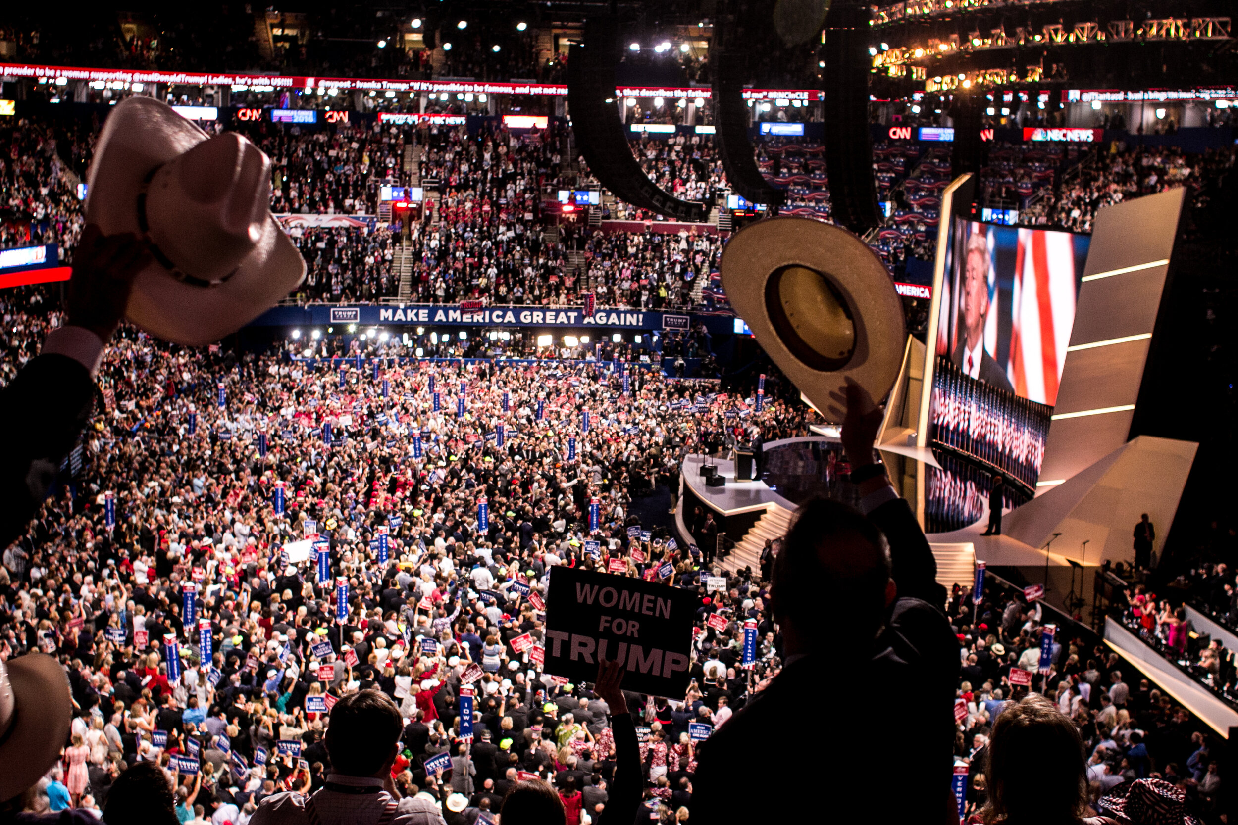  Attendees cheer as Republican presidential candidate Donald Trump is introduced during the Republican National Convention on July 21, 2016 at Quicken Loans Arena in Cleveland, Ohio. 