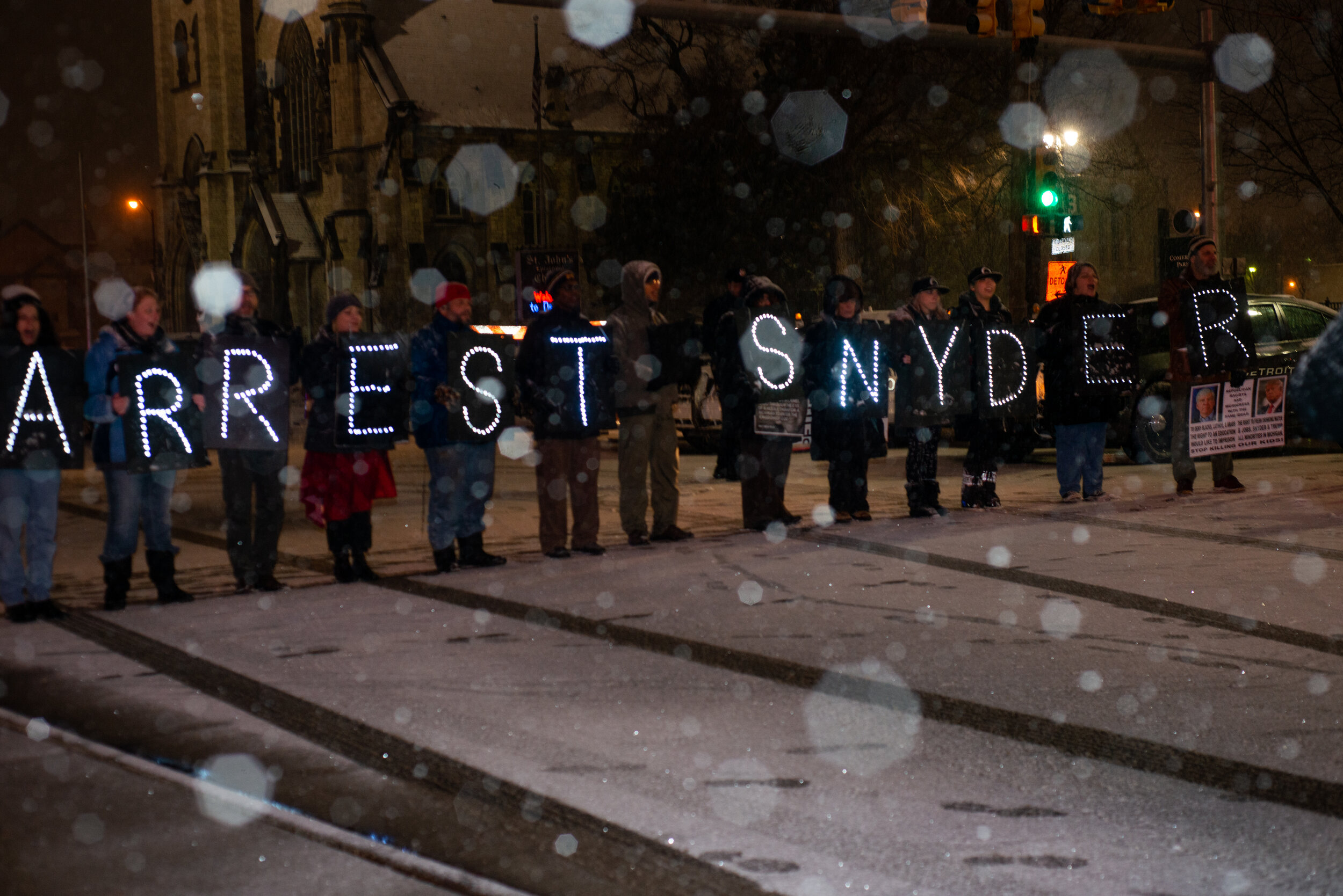  Protesters demanding the arrest and resignation of former Michigan governor RIck Snyder in his involvement with the Flint Water Crisis gather outside of the Republican Presidential at the Fox Theater on March 12, 2016 in Detroit, Michigan. 