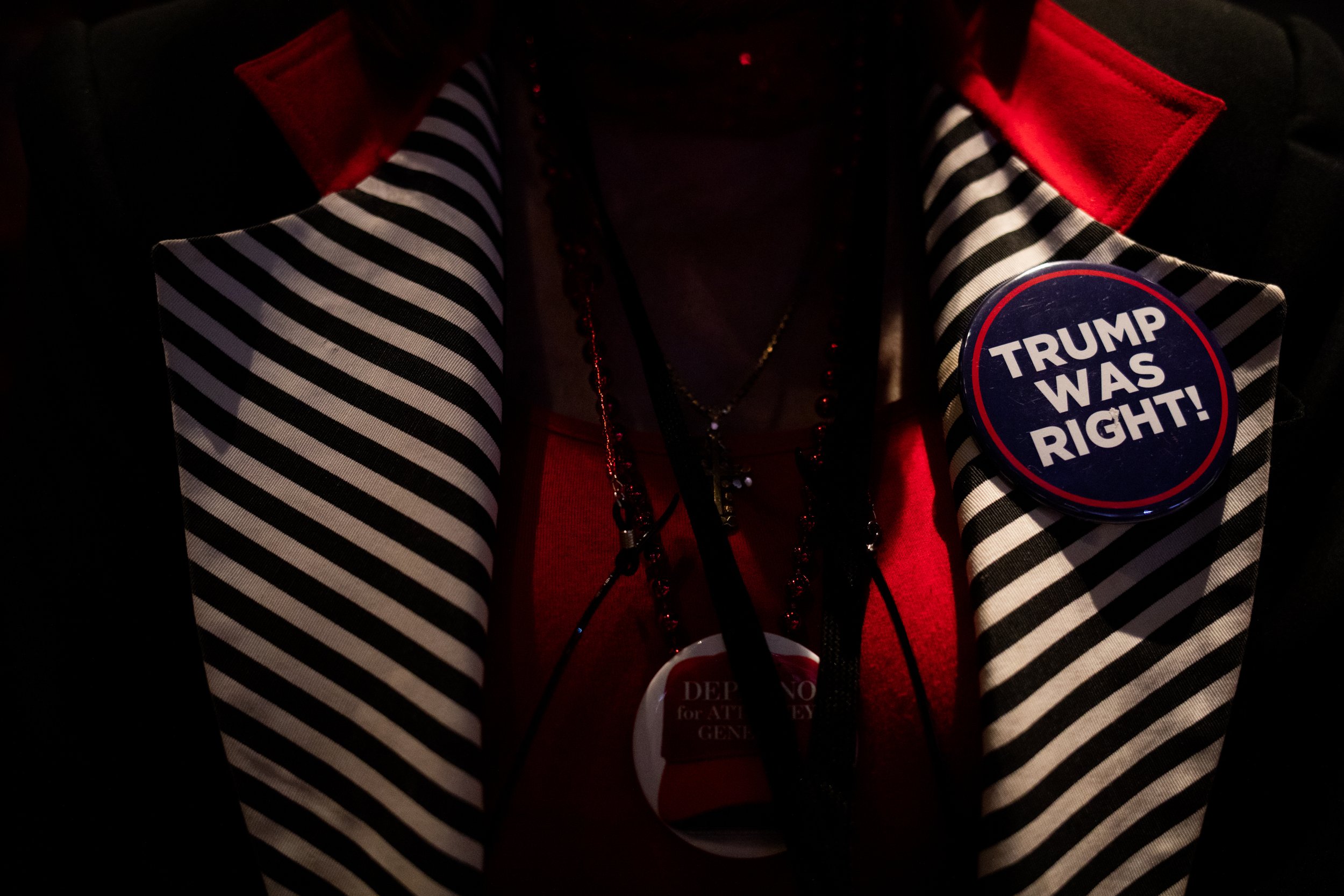  An attendee dons a ‘Trump was right’ pin during the Michigan GOP Convention at the Lansing Center in Lansing, Michigan, U.S. August 27, 2022. Emily Elconin for The New York Times  