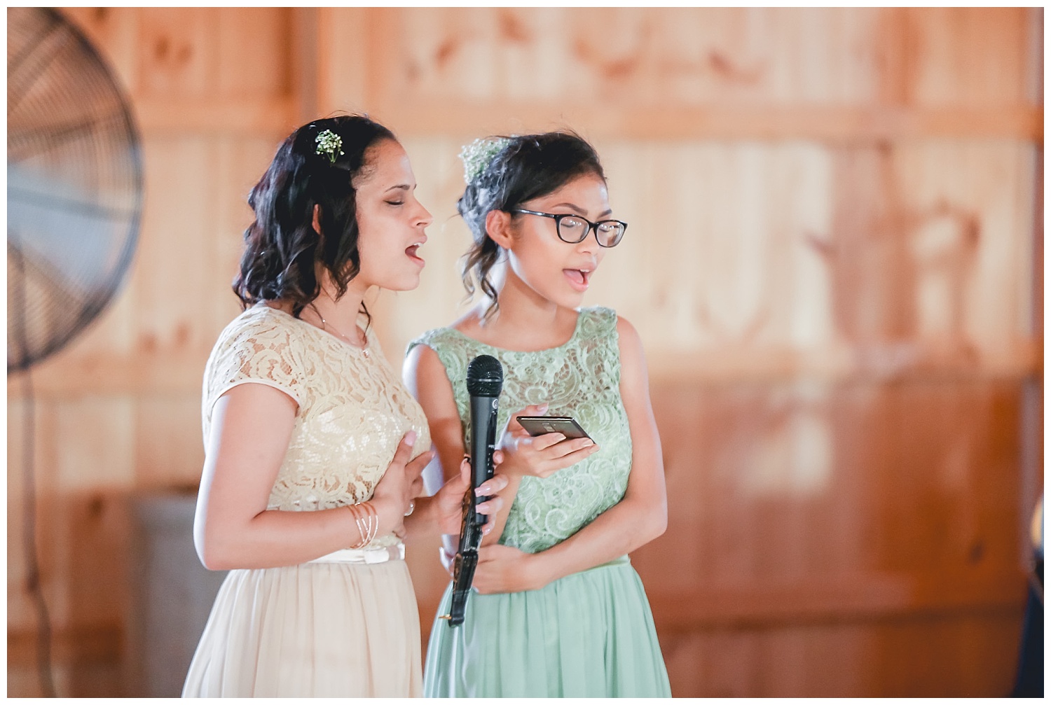bridesmaids sing for bride and groom