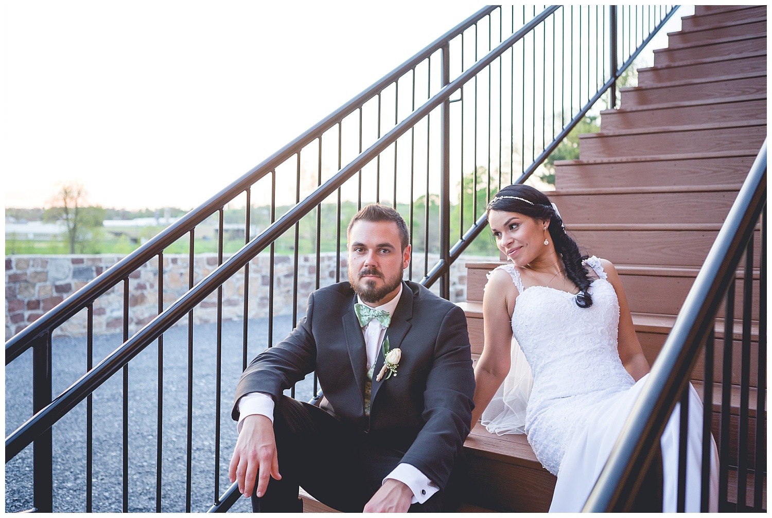 bride and groom portrait on stairs