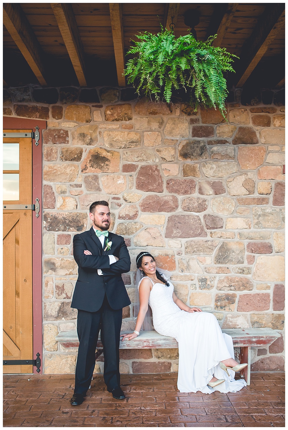 bride and groom portrait outside barn