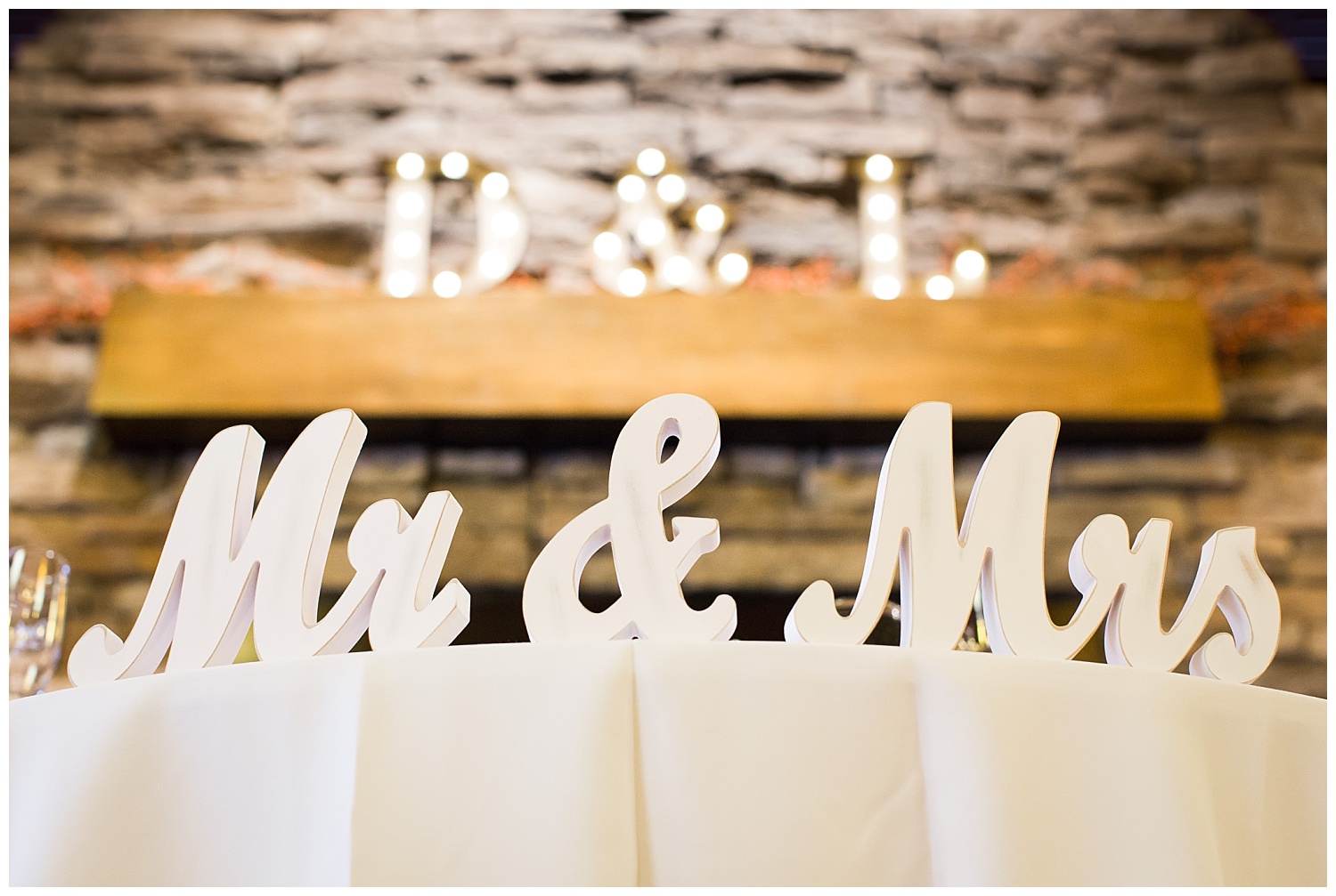 mr. and mrs. sign on table