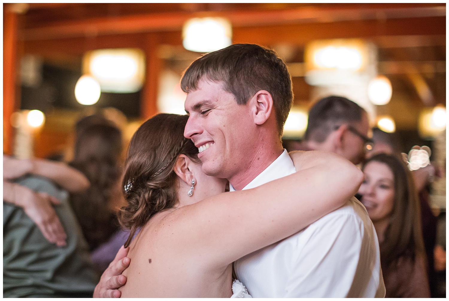 bride and groom dance at wedding reception