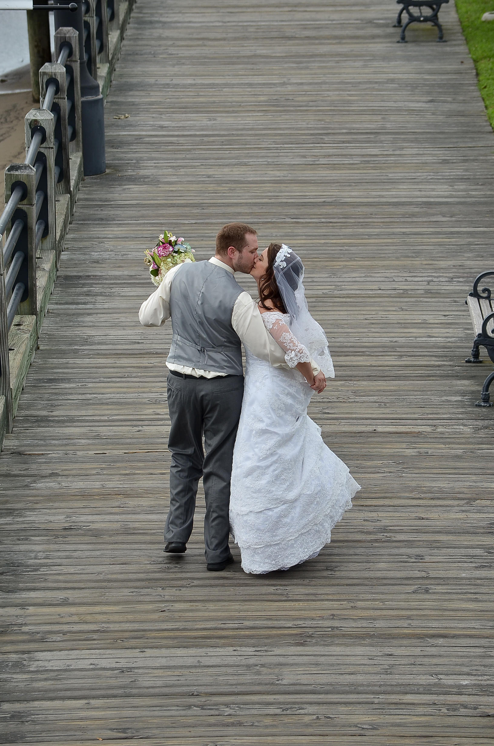 Bride and groom walk.