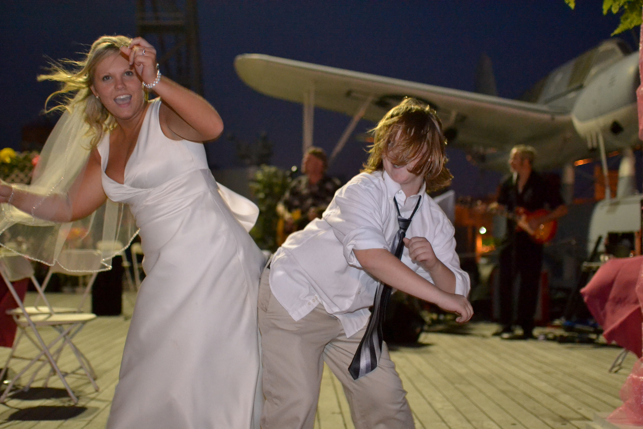 Bride dancing with guest.