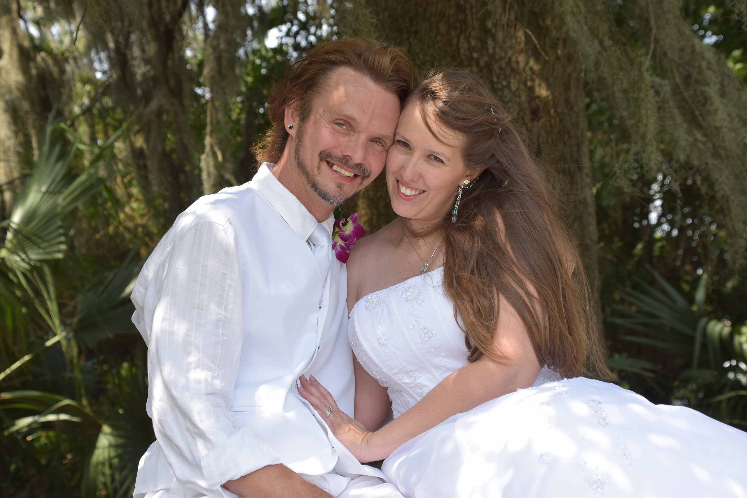 Posed portrait of bride and groom.