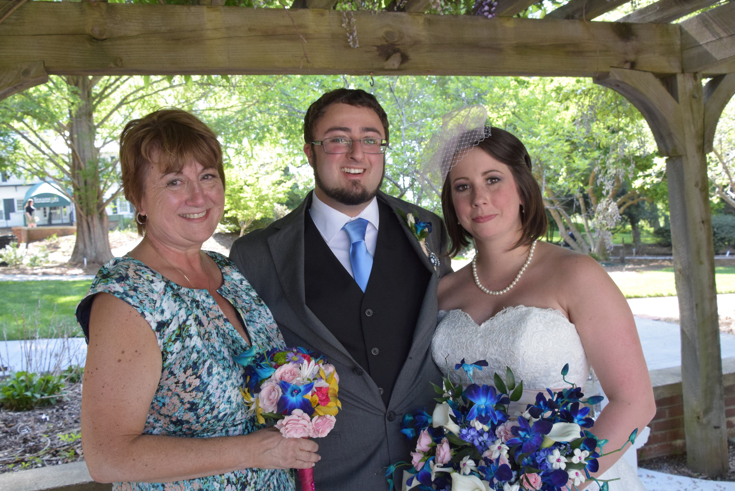 Bride, groom and mom.