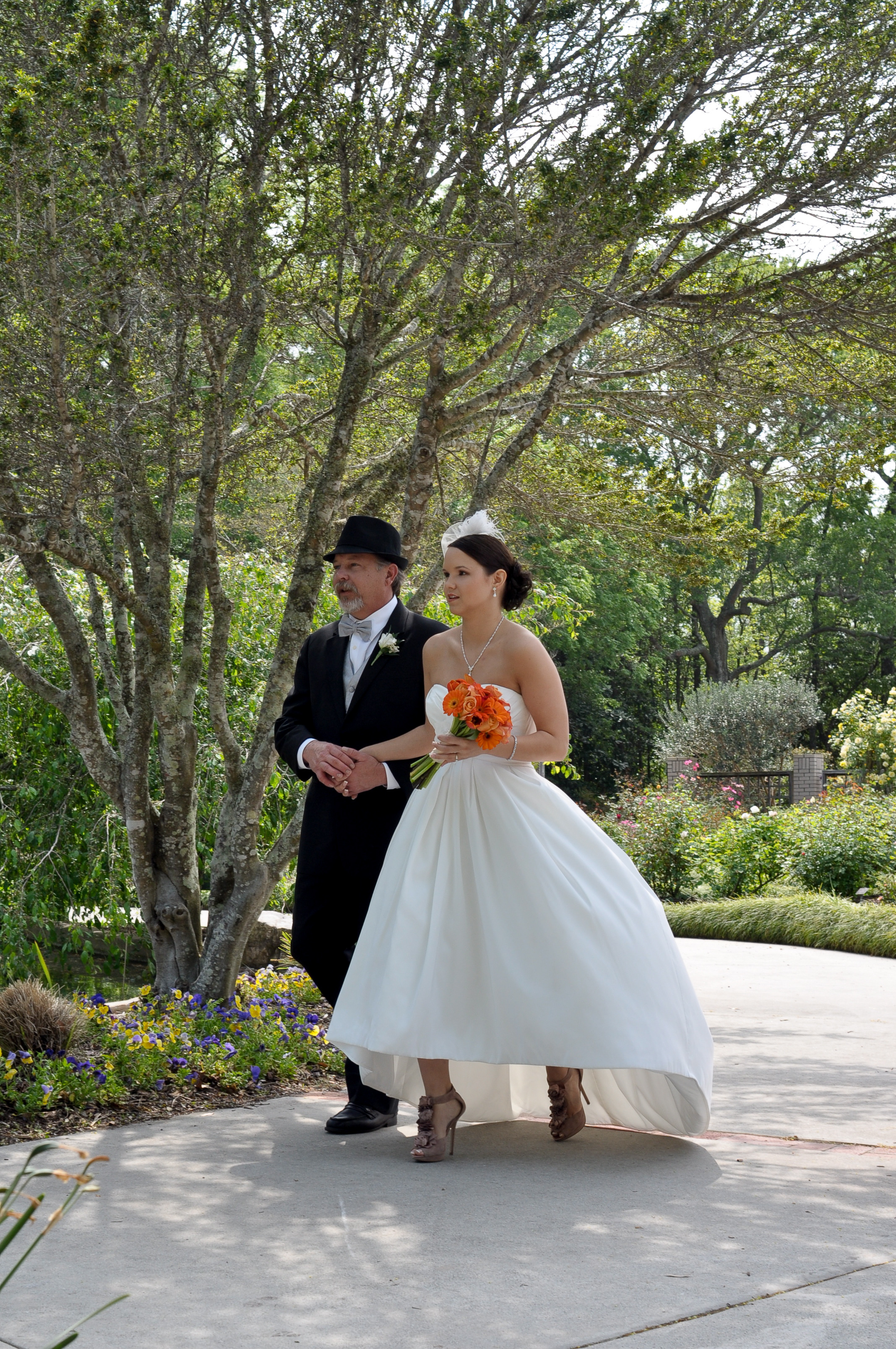 Dad walking his daughter to her wedding ceremony.