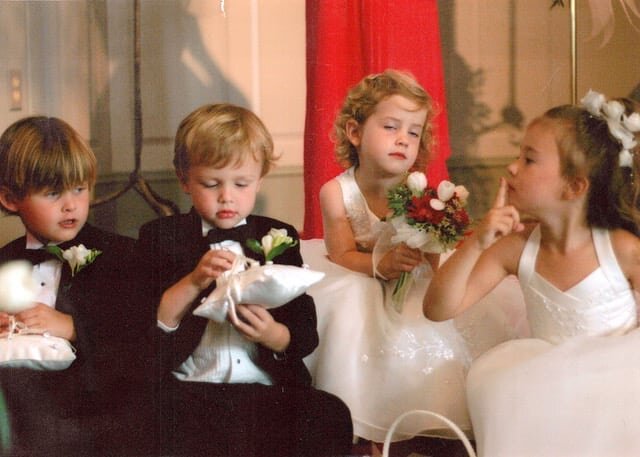 One of my favorite candid pics. While the wedding ceremony was being performed, the flower girl was telling the ring bearers to be quiet. From a wedding at least 10 years ago. 
#wilmingtonweddings #wilmingtonncphotographer #billybeach #candidphotogra