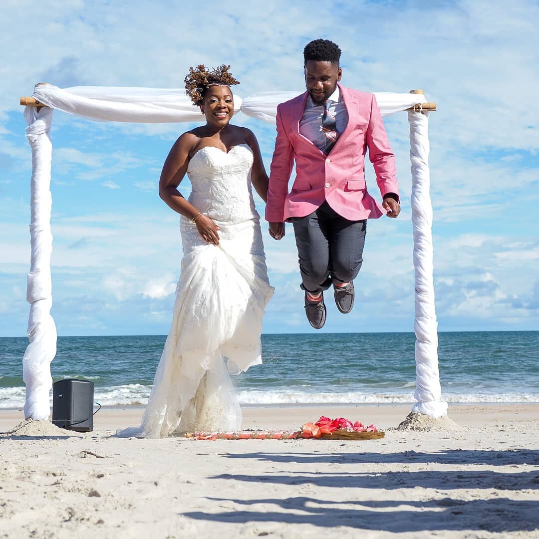 Jumping the broom. From a great wedding I photographed this past summer. Topsail Island, great weather, nice family and one of the funniest preachers I've ever worked with. We actually rehearsed the jumping shot at the rehearsal, so glad we did. 
#oc