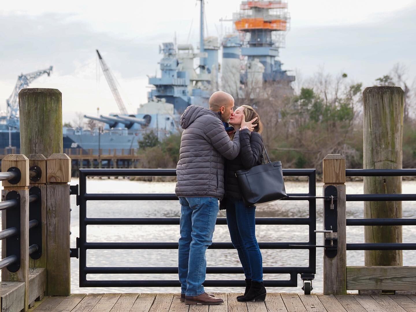 She said yes! Beautiful proposal in downtown Wilmington, NC.  Former US Navy sailor wanted to do it across the River from the Battleship. We had set up a signal when he was ready to propose. She had no idea I was taking pictures. Wedding will take pl