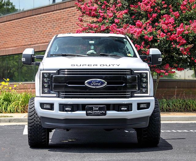 Chrome delete and color matched bumpers on this clean F350. Oxford white and black always looks 🔥