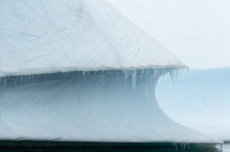 Iceberg, icicles. Arctowski Peninsula, Antarctica