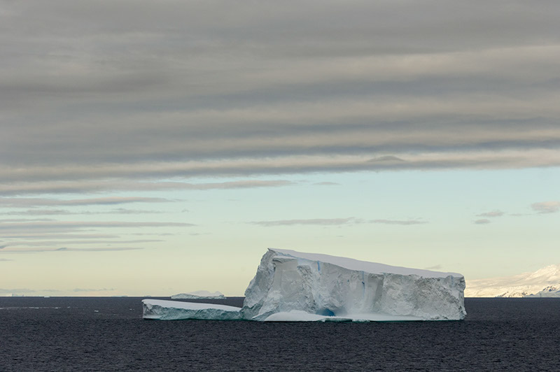 Iceberg Under Cloud. North of Antarctica