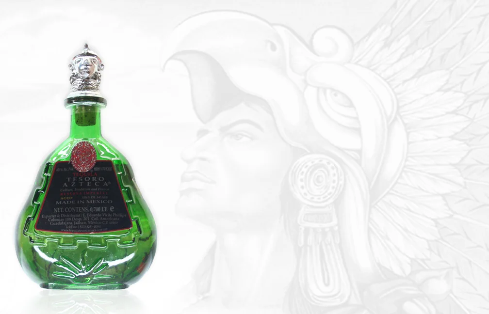 TESORO AZTECA NOM-1079 Tesoro Azteca Tequila is a treasure hunter’s ultimate find. It is a unique, vintage tequila produced in the year 2000 at a small, artisanal distillery. This distillery located in Jesus Maria, was unconventional at the time, fermenting the agave juices together with the agave fiber, thus yielding a very prominent Los altos de Jalisco (Highlands) agave flavor. This distillery also produces Tequila Oro Azul.