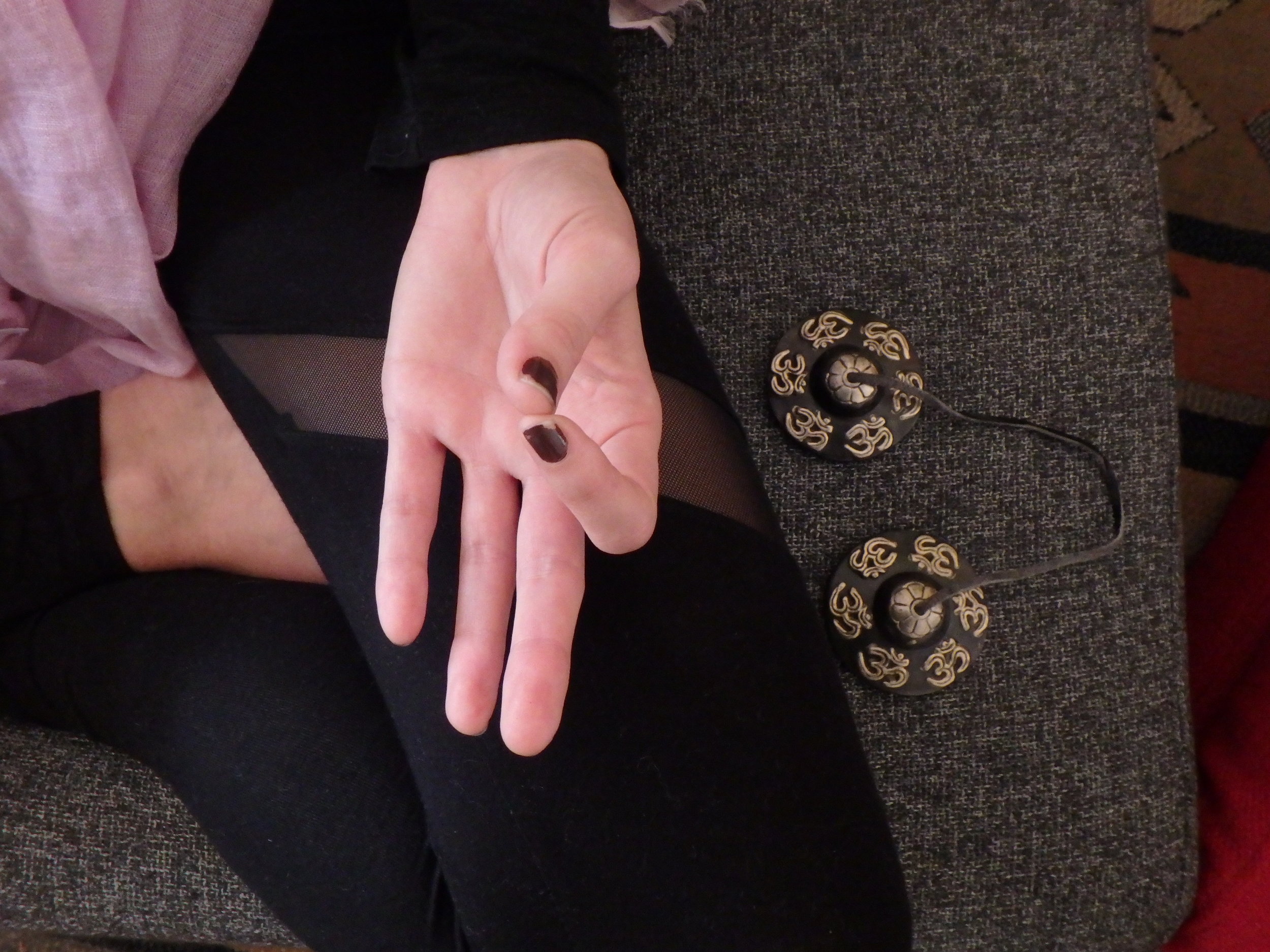 emma hand and bells.JPG