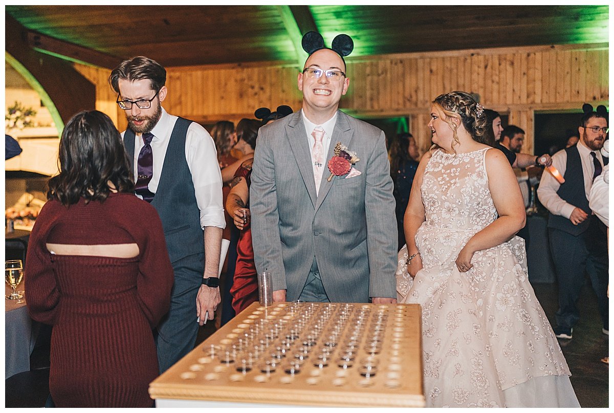 Couple at their reception having fun.