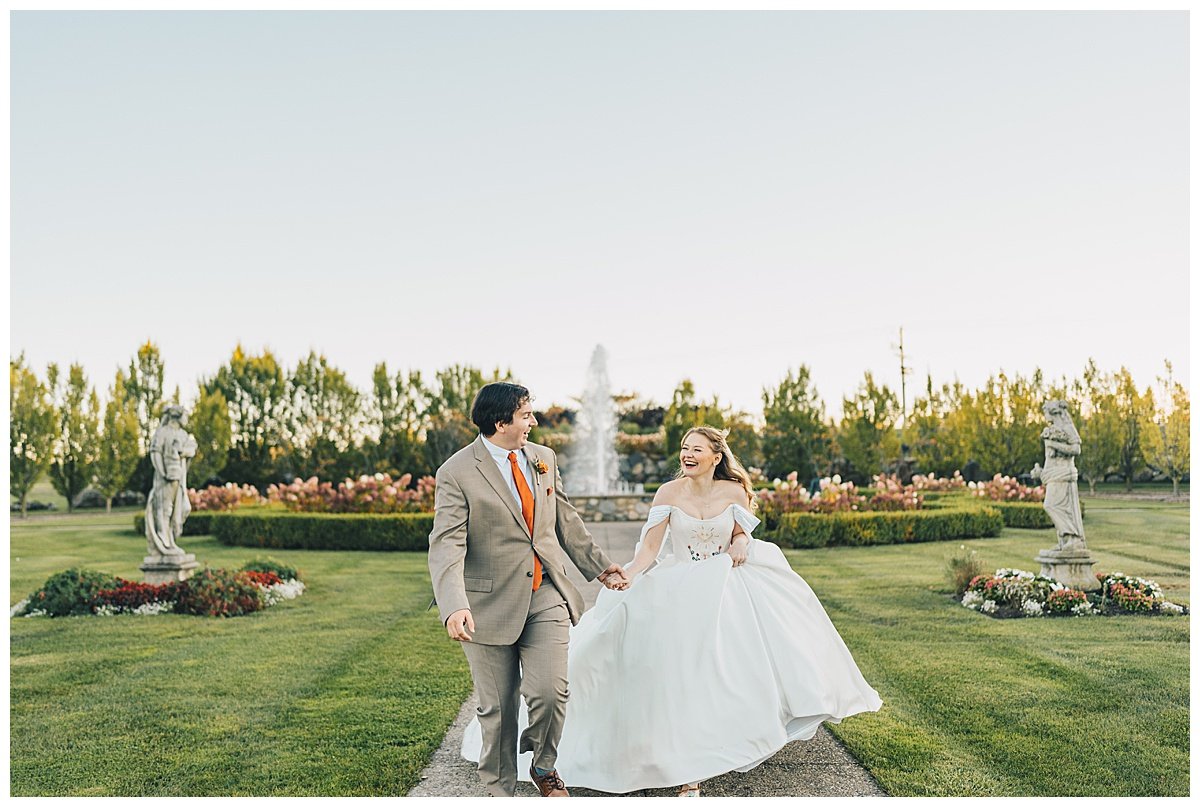 Couple running together at their wedding venue in Nashville