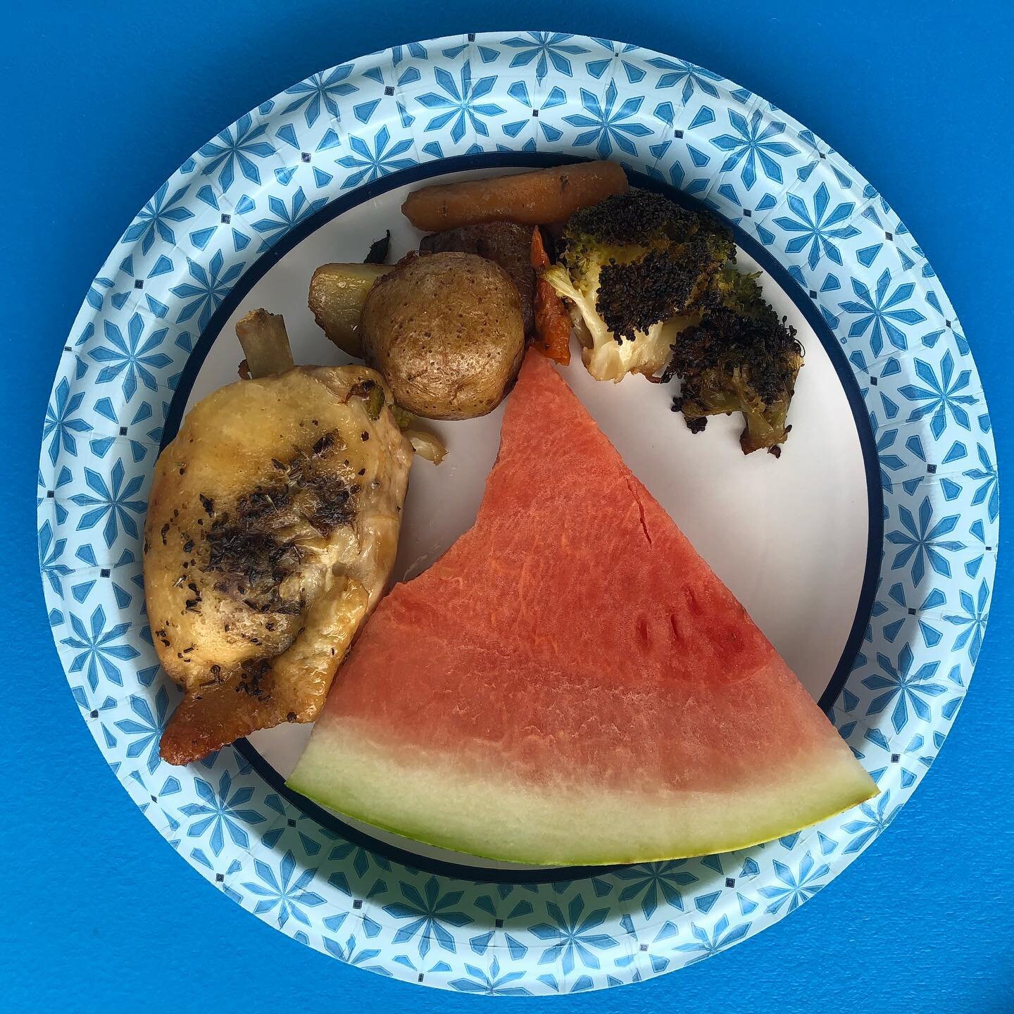 By the time I had everything set up for our picnic outside a storm started to blow through. We ended up eating in the garage and watched the storm, which was pretty cool. 
- chicken thigh
- roasted veggies 
- watermelon 
.
This chicken was originally