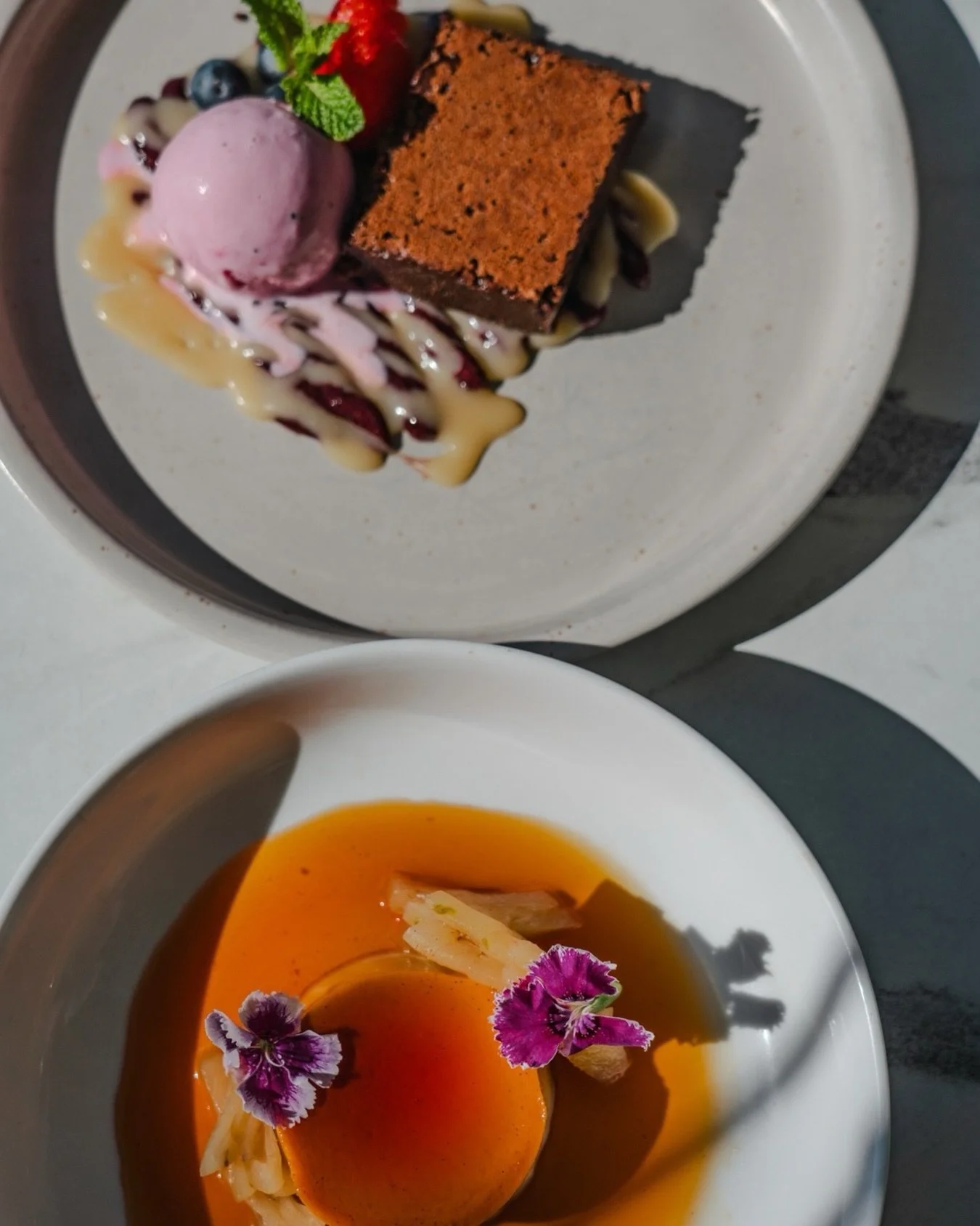 Two new reasons to treat yourself 🤎🍮

Decadent flourless chocolate brownie or silky creme caramel? The hardest choice you&rsquo;ll make today.

.
.
.

#chocolatebrownie #cremecaramel #noosarestaurant #noosaeats #noosafood