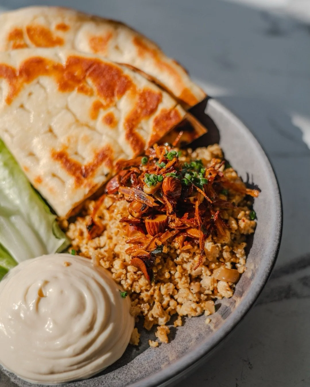 New on our vegan menu 🌱

Tofu mince &bull; Tahini mayo &bull; Baby cos &bull; Crispy chilli oil &bull; Warm pita

Big flavour. Zero compromise. 🔥🥙🌱

.
.
.

#sunshinecoastvegans #noosafood #noosarestaurant #noosaeats #veganmenusunshinecoast