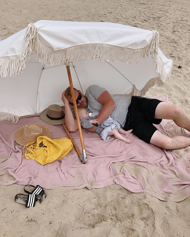 Beach naps. ☀️ (oh and Wesley said &ldquo;dada&rdquo; this weekend)