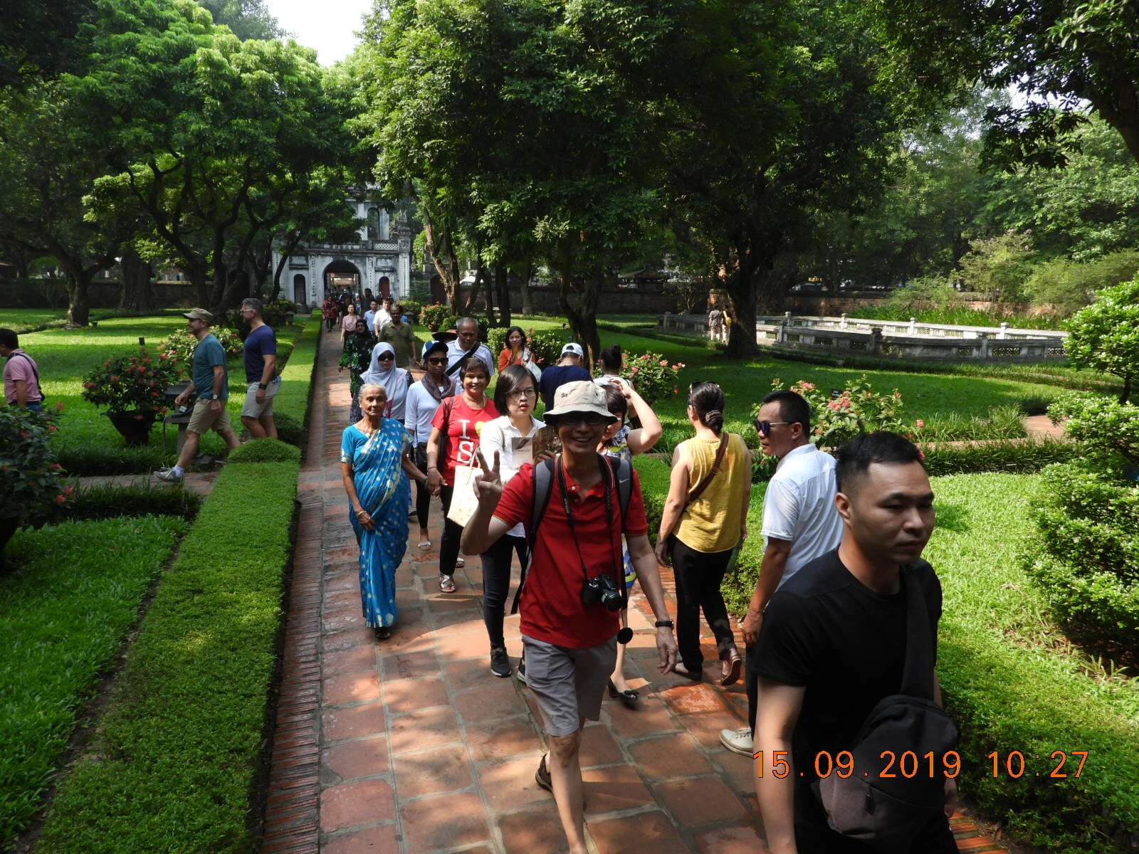 Strolling the landscaped gardens in Temple of Literature.JPG