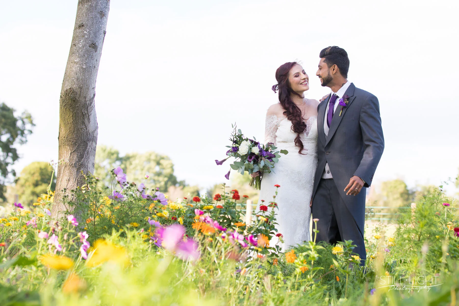 Couple walking through the landscaped grounds
