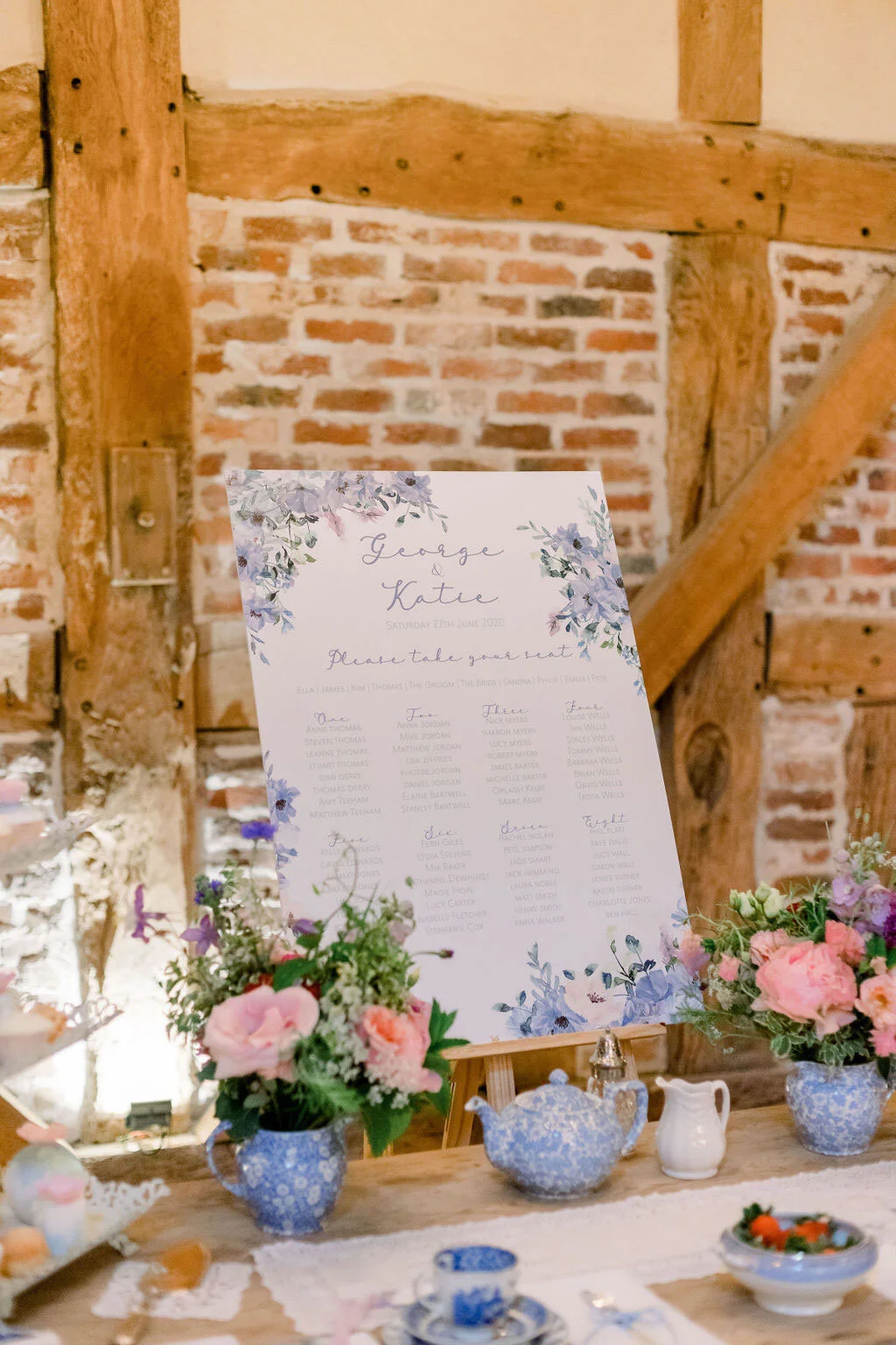 Close-up of handcrafted wedding stationery featuring botanical details