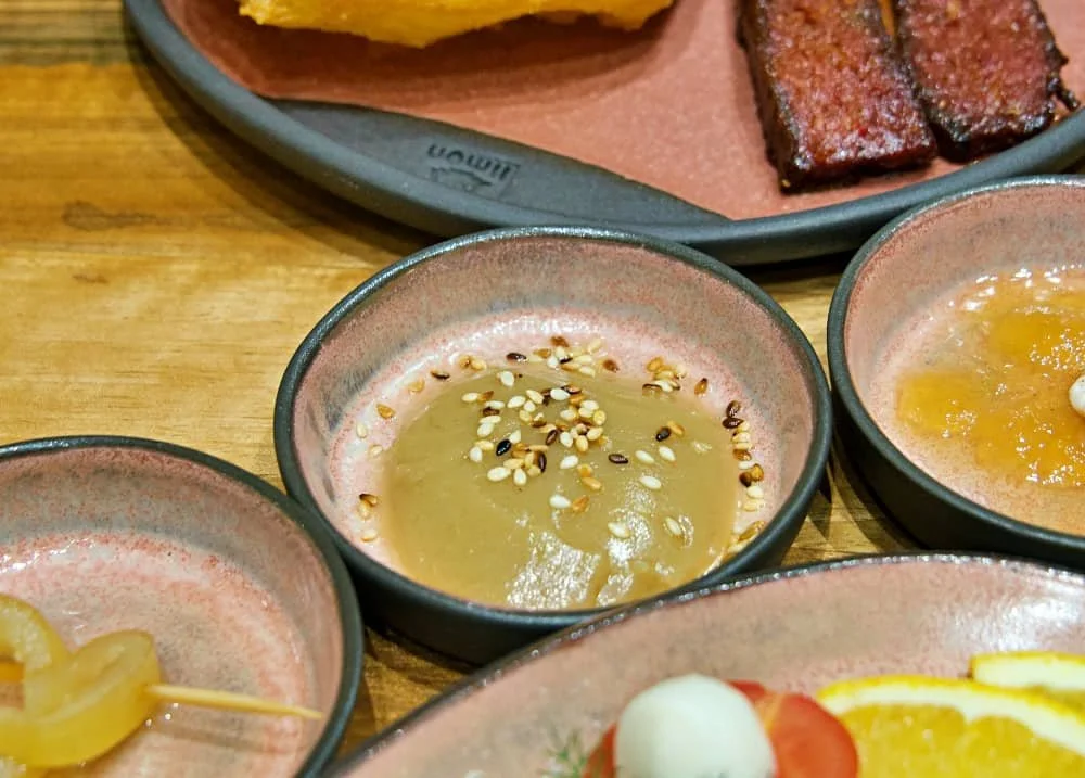 Close up of sahine, a tahini based spread, sprinkled with sesame seeds at Limon Kahvalti in Galata, Istanbul