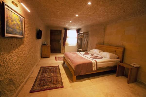 A cosy cave room at Narcissos Cave Hotel, best hotels with view in cappadocia