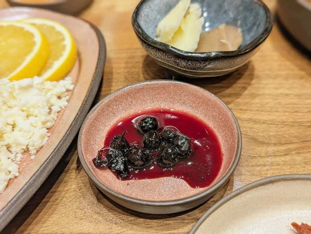 Close up of a dish of homemade blueberry jam at Limon Kahvalti