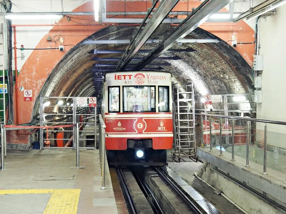 Red and white nostalgic tram on Istiklal avenue